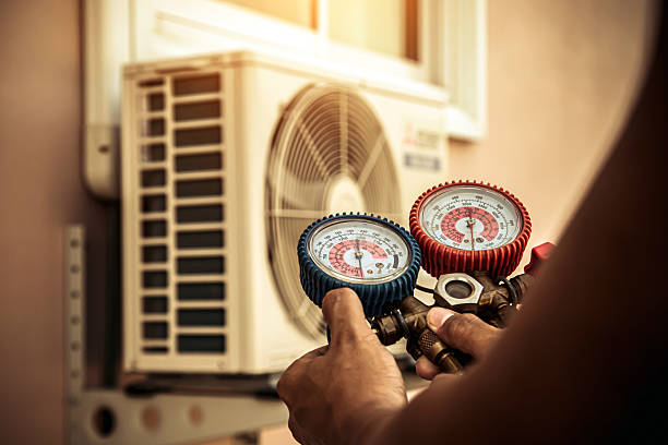 Professional Heat Pump Repair technician working in Pawleys Island, SC